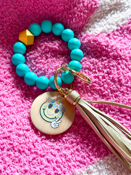 Teal Groovy Smiley Silicone Bead Wristlet